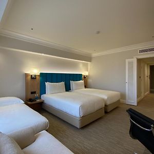 Premier Deluxe Triple Room